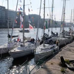 Yachts with flags on a pontoon