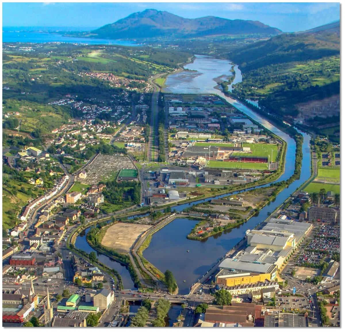 Aerial view of Newry, the river and canal with Carlingford Lough in the distance