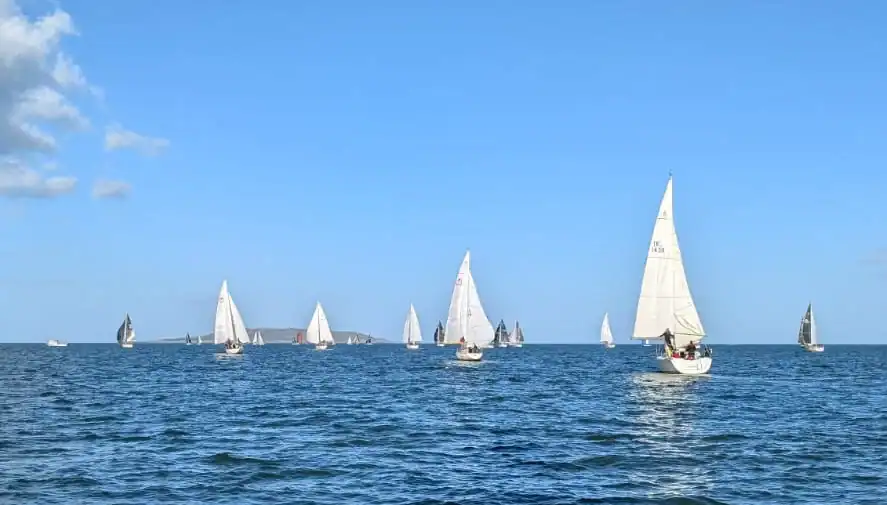 Yachts sailing downwind towards Lambay Island