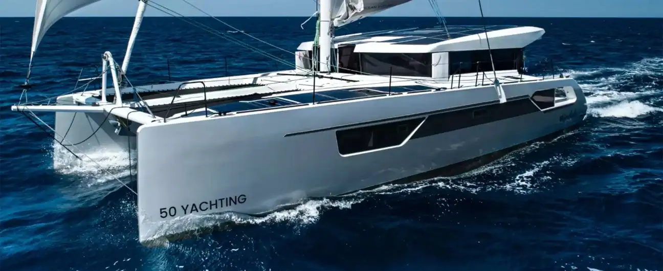A modern catamaran under way at sea